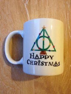 a coffee mug with the words happy christmas written on it