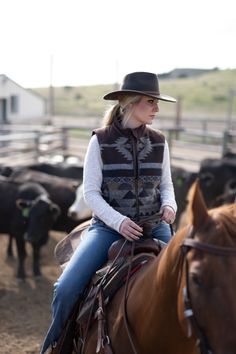 Every cowgirl's favorite vest is back! The Maybelle Vest has been a favorite for years with its eye-catching Aztec pattern along with its microsuede trip and flatter cut. Staying warm has never looked so good! Winter Riding Outfits, Working Cowgirl, Horse Girl Outfits, Fancy Western Outfits, Rodeo Clothes, Dream Ranch, Work Appropriate Outfits, Riding Outfits, Winter Riding