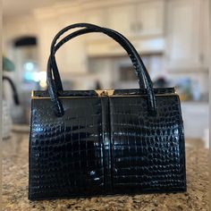 Black Genuine Crocodile Bag, Very Good Condition. It’s From The 60s. Black Crocodile Skin With Yellow Gold Hardware. Leather Lined Inside With One Zipper Pocket. Very Clean (See Photos) Crocodile Bags, Crocodile Skin, The 60s, Gold Hardware, Mini Bag, Zipper Pocket, Bag Lady, England, Yellow Gold