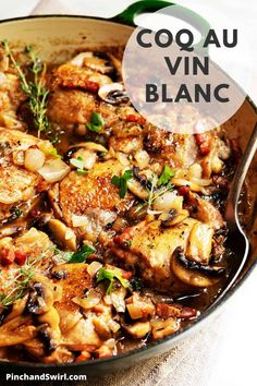 a skillet filled with chicken and mushrooms in a sauce that says coq au vin blancc