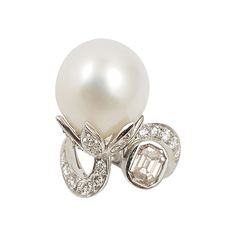 South Sea Pearl, Brown Diamond 0.83 carat with Diamond 1.12 carats Ring set in 18 Karat White Gold Settings Width: 1.5 cm Length: 2.5 cm Ring Size: 53 Total Weight: 11.64 grams "We first opened doors in 1980 when it was then situated in the vicinity of the Victory Monument; a small and modest storefront with a couple of counters. From its humble beginnings to where it stands today, our company has proven its abilities as a jeweler. Since the beginning, we have been supplying fine quality pieces Luxury Diamond White Brilliant Cut Pearl Ring, Luxury Brilliant Cut Diamond Pearl Ring, Luxury Pearl And Diamond Ring With Brilliant Cut, Luxury Brilliant Cut Pearl Anniversary Ring, Luxury Anniversary Pearl Ring With Brilliant Cut, Luxury Diamond Pearl Ring For Anniversary, Diamond White Pearl Ring With Brilliant Cut, Fine Jewelry Platinum Pearl Ring With Brilliant Cut, Exquisite Diamond Pearl Ring With Brilliant Cut