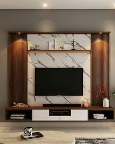 a modern living room with marble and wood accents on the wall, coffee table and television