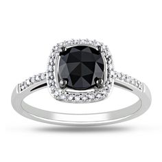 This gorgeous ring from the Miadora Wedding Collection features a cushion-cut black diamond center stone with diamond side stones set in 14-karat white gold. The jewelry is finished with a high polish. Center stone Center cut: Cushion Diamond: One Weight: 1 carats Color: Black Setting: Prong Side stones Diamonds: 40 Di Black Rocks, Ladies Jewellery, Black Gold Jewelry, Black Diamond Engagement, Chocolate Diamonds, Gorgeous Ring, White Diamond Ring, Black Diamond Ring Engagement, Diamond Bridal Sets