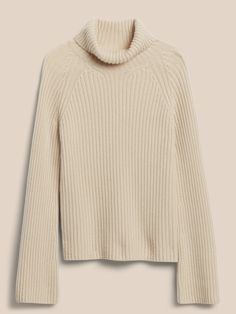 Crafted from our most luxurious cashmere yarn, this soft sweater is based on an original piece from the Banana Republic archives> Take note how our designers artfully arranged its ribbed-knit stitches to flow freely from the sleek mock-neck down to t Elegant Textured Knit Turtleneck For Fall, Cashmere Ribbed Funnel Neck Sweater, Ribbed Cashmere Sweater With Funnel Neck, Ribbed Funnel Neck Cashmere Sweater, Ribbed Merino Wool Top For Fall, Ribbed Cashmere Turtleneck Top, Ribbed Merino Wool Sweater For Fall, Stretch Ribbed Cashmere Sweater, Stretch Ribbed Merino Wool Sweater