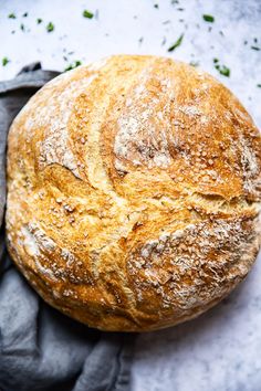 a loaf of bread sitting on top of a cloth