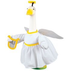 a white and yellow bird dressed in a dress with wings, holding a small object