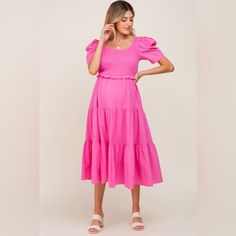 A Solid Hued Midi Dress Featuring A Smocked Top, Shirt Off Sleeves, A Tiered Skirt, A Self-Tie Open Back And A Rounded Neckline. &Merci By Pinkblush New Without Tags Small Inventory #P6590 Medium Inventory #P6589 Large Inventory #P6505 Pink Smocked Midi Dress For Spring, Pink Midi Dress With Smocked Bodice For Casual Wear, Pink Smocked Dress With Gathered Sleeves For Spring, Spring Casual Smocked Dress With Ruffle Hem, Spring Smocked Dress With Ruffle Hem For Casual Wear, Pink Fitted Smocked Dress In Midi Length, Smocked Midi Dress For Brunch, Puff Sleeve Smock Midi Dress For Brunch, Pink Puff Sleeve Smocked Dress For Spring