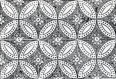 an intricately designed tile in black and white, with circular designs on the sides