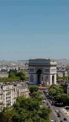 an aerial view of the arc de trioe triumph in paris, with traffic passing by