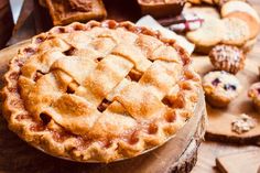 several pies and pastries are on the table