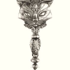 a black and white drawing of a cat's head on top of a pole