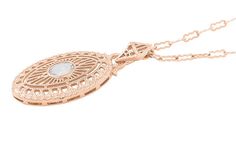 This unique Art Deco pendant necklace is hand crafted in sterling silver and finished in warm 14K rose ( pink ) gold. At its center is an oval brilliant cut natural white topaz of 1.50 carat in a secure high polish bezel setting. Filigree openwork radiates from the center of the pendant, with a double oval filigree scallop and scroll open work frame surrounding the outer edges. A finished open filigree gallery around the sides of the pendant and a generously sized arrowhead filigree bail enhance Art Deco Pendant Necklace, Art Deco Pendant, White Topaz, Rose Pink, Bezel Setting, Pink Gold, Gold Vermeil, Unique Art, Pink Roses