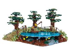 a lego model of a pond and trees