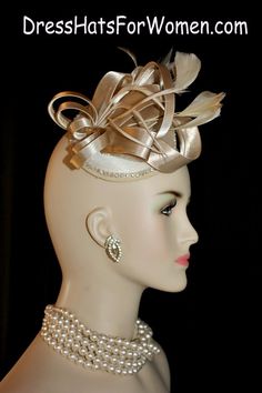 Champagne Beige Satin Wedding Fascinator Cocktail Hat For Women. Couture Bespoke 1920's Flapper Era Designer Fashion Hat - Trimmed With A Large Looped Champagne Beige Satin Bow, Accented With Delicate Beige Feathers, Embellished With A Beautiful Row Of  Rhinestones. This Satin Wedding Fascinator Is Held In Place By An Ali gator Hair Clip. This Is A Beautiful Headpiece For A Bride Or Wedding Guests. Also Suited For Mother Of The Bride Or Groom.

Measurements: The Fascinator Satin Base Measures 13 Elegant Party Headpiece With Structured Crown, Fitted Bridal Accessories For Royal Ascot Party, Fitted Bridal Accessories For Kentucky Derby Party, Elegant Evening Hat Headpiece, Elegant Party Costume Hats With Structured Crown, Elegant Evening Headpiece With Structured Crown, Elegant Headpiece With Structured Crown For Events, Elegant Mini Party Hats With Pinched Crown, Elegant Fitted Wedding Headpieces