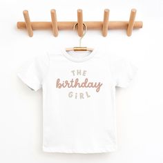 Looking for a cute tee for your kids? We have the perfect The Birthday Girl graphic tee addition to their closet! Also available in toddler tees. Girls Graphic Tee, Toddler Tees, Birthday Girl, Girl Birthday, Toddler Girl, Fitness Fashion, Short Sleeve Tee, Graphic Tee, Top Shirt