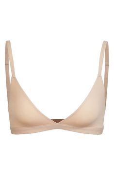 Enjoy the comfort of a bralette while retaining the breathability of quick-dry fabric with this comfortable option from Kim Kardashian West's SKIMS. Available in nine different shades, this second-skin triangle bra offers natural support and comfort while you read, lounge and sleep. Style Name:Skims Fits Everybody Triangle Bralette (Regular & Plus Size). Style Number: 6016426. Available in stores. Plus Size Style, 2024 Christmas, Triangle Bralette, Window Shopping, Triangle Bra, Clothing Sets, Second Skin, Christmas List, Kim Kardashian