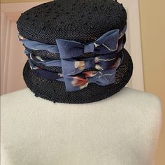 Authentic Mon Cheri Luxury Fashion Women's Hat Color Black Straw.Brand New With A Tag. Circumference 22.3/4” Vintage Black Hat For Spring, Vintage Black Straw Hat For Beach, Vintage Black Straw Beach Hat, Elegant Black Cloche Hat For Beach, Elegant Black Cloche Hat For The Beach, Black Brimmed Mini Hat One Size, Black Brimmed Mini Hat, One Size, Elegant Black Bucket Straw Hat, Adjustable Black Straw Bucket Hat