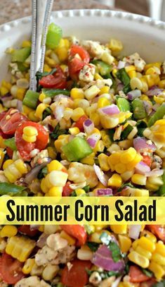 a white bowl filled with corn salad on top of a table