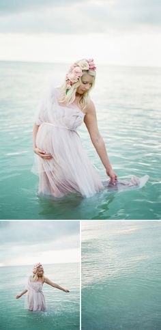 a woman in the water wearing a dress