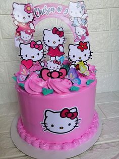 a hello kitty birthday cake with pink frosting