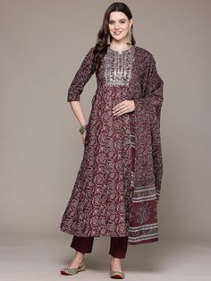 Floral Printed Sequinned Pure Cotton Kurta With Trousers & Dupatta PRODUCT DETAILS  Burgundy printed Kurta with Trousers with dupatta Kurta design: Floral printed Anarkali shape Regular style Round neck, three-quarter regular sleeves Sequinned detail Calf length with flared hem Pure cotton machine weave fabric Trousers design: Solid Trousers Partially elasticated waistband Slip-on closure Size & Fit The model (height 5'8) is wearing a size S Material & Care Pure Cotton Machine Wash Specification Fitted Ankle-length Sets With Printed Motifs, Ankle-length Printed Motifs Salwar Kameez, Anarkali Style Printed Dupatta, Anarkali Tops, Three Quarter Sleeve Tops, Flare Top, Kurta Designs, Anarkali, Top Pattern