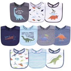 six bibs with dinosaur designs on them, all in different colors and sizes for babies