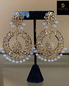 Ready to ship chandbali made using fresh water pearls , cz polki and 22carat gold plating length of earrings 3.2 inch width of earrings 1.8 inch Luxury Cutdana Chandbali Earrings, Luxury Meenakari Pearl Earrings For Wedding, Luxury Chinon Chandbali Saree, Luxury Chandbali Pearl Earrings With Intricate Design, Luxury Gold Chandbalis For Festivals, Luxury Chandbali Jeweled Danglers, Luxury Gold Dangle Chandbalis, Elegant Designer Chandbalis For Festivals, Elegant Chandbalis For Festivals