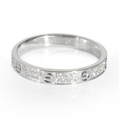 a white gold ring with diamonds on it