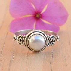 Elegant Nickel-free Crystal Ring, Nickel-free Elegant Crystal Ring, Sterling Silver Pearl Birthstone Ring, Elegant Nickel-free Ring, Adjustable Pearl Ring For Gift, Adjustable Round Band Pearl Ring For Gift, Adjustable Round Pearl Ring For Gift, Adjustable Stackable Round Pearl Ring, Adjustable Pearl Birthstone Ring