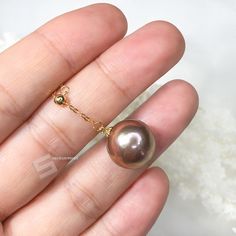 Genuine Kasumi pearl in rich and intriguing exotic color with strong metallic overtone, sized 12.5 mm, perfect round shape set in simple well-made 18KT solid yellow gold lariat chain. The surface of pearl is very clean, there is only one slightly growing mark on the back side, can not be shown by pictures. All pearls in shop are picked by hand to assure the high quality of luster and surface, it is a perfect gift for Anniversary, Birthday, Engagement, Wedding, Mother's day, Valentine's day or ju Pearl Necklace With Adjustable Chain, Round Pearl Necklace With Adjustable Chain, Elegant Gold Necklaces With Interchangeable Details, Stackable Necklaces, Gold Lariat Necklace, Floating Necklace, Sea Pearls, Real Pearls, Pearl Choker