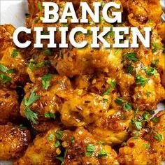 the words bang chicken are in front of a plate full of fried meats and garnished with parsley