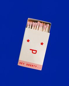 a pack of matches with an emoticive face on it and the caption hey overly