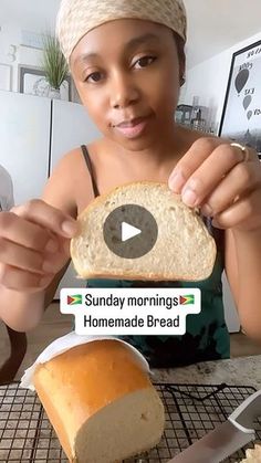 a woman holding a piece of bread in front of her face with the caption sunday mornings homemade bread