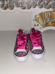 Custom Bling Converse All Star Chuck Taylor Sneakers. All designs handmade and embellished with a variety of high quality crystals. Great for weddings, proms, homecomings, birthdays, special events or just your everyday girly girl. Turn around time is currently 2 - 3  weeks **IF YOU NEED THIS ITEM BEFORE THE PROJECTED SHIPPING TIME YOU MUST CONTACT US BEFORE ORDERING (additional charges may apply) **Shoe Details:Classic WHITE low top Converse All Star Chuck Taylor Sneaker (cloth material style; Pink Embellished Sneakers For Party, Pink Rhinestone Party Sneakers, White Low Top Converse, Bling Converse, Ribbon Shoes, Low Top Converse, Happy Birthday Girls, Custom Bling, Bling Shoes