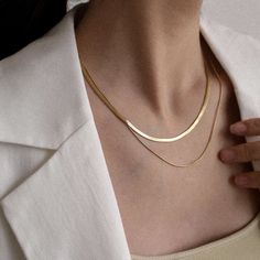 DOUBLE HERRINGBONE NECKLACE – Shapes Studio Herringbone Chain Necklaces, Layered Herringbone Necklace, Herringbone Necklace Layering, Minimalist Double Chain Herringbone Necklace, Minimalist Herringbone Necklace For Layering With Double Chain, Gold Double Strand Herringbone Necklace, Necklace Shapes, Gold Double Strand Herringbone Necklace With Adjustable Chain, Minimalist Gold-plated Herringbone Necklace With Delicate Chain