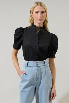 The Finley Ruffle Button Down Top will sweeten up your closet! Lightweight fabric shapes short puffy sleeves with pleats on the shoulders and a ruffle high neck. The back maintains a classic fit. Functional button placket accents the bodice. Wear it with any bottoms of your choice. - Ruffle trim- Button up- Puffed short sleeves- Blouse- Comes in 2 colorsSize + Fit - Model is 5'8" and wearing size XS- Measurements taken from size S - Chest: 19 1/2"- Length: 24 3/4" Fabric Self: 100% Cotton Style Oversized Button Down Shirt, Puffy Sleeves, Cotton Style, Short Sleeve Blouse, Ruffle Trim, Button Downs, Fitness Models, Short Sleeves, Blue And White