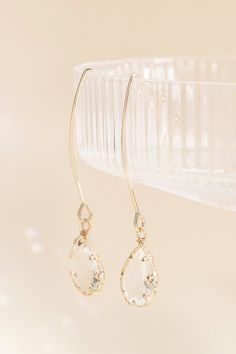 These glass teardrop hook earrings are the perfect addition to your bahcelorette going-out look. Shop our jewelry collection today. Make an entrance anywhere with these fun, dangly hook earrings with gorgeous glass teardrops. Wear them with your bridesmaid dress or with a chic-casual outfit for a bachelorette brunch. | Jewelry | Birdy Grey Chambers Glass Drop Earrings Elegant Glass Drop Earrings, Party Pearl Drop Long Teardrop Earrings, Party Long Drop Pearl Teardrop Earrings, Party Long Drop Teardrop Earrings With Pearl, Elegant Dangle Glass Jewelry, Elegant Glass Dangle Jewelry, Teardrop Wire Wrapped Jewelry For Party, Wire Wrapped Teardrop Jewelry For Parties, Elegant Glass Drop Jewelry