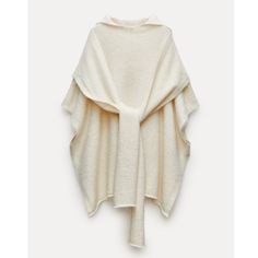 Nwt. Full Cut Sweater Made With Alpaca. Hooded Collar And Elbow-Length Sleeves. Multi-Positional Knotted Straps. Oversized Beige Shawl Collar Outerwear, Oversized Winter White Outerwear For Layering, Oversized White Outerwear For Layering, Oversized Beige Cape Outerwear, Oversized Neutral Sweater Coat For Winter, Oversized Long Sleeve Chic Cape, Oversized Chic Long Sleeve Cape, Chic Oversized Long Sleeve Cape, Oversized Cape Sweater For Fall