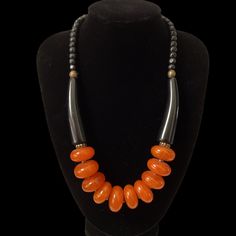 Beautiful Onyx And Orange Statement Necklace Nwot. Never Worn. Has Brass Beads In Between Orange Beads. Lobster Clasp With 3 Inch Extender. Necklace Is 22 Inches Long. Made Out Of Resin. Orange Necklace With Black Round Beads, Adjustable Orange Necklace With Black Beads, Adjustable Orange Necklaces With Black Beads, Orange Statement Necklace, Brass Beads, African Jewelry, Black Orange, Orange Black, Womens Jewelry Necklace