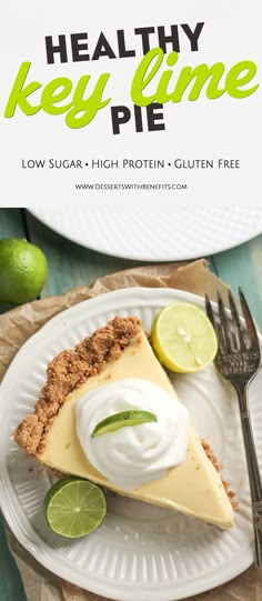 a slice of key lime pie on a plate with whipped cream and lime wedges