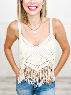 Be a boho babe with our Crochet Cropped Bustier Tank Top! This playful piece features delicate crochet and sassy fringe, perfect for any festival or beach day. Keep it cool and carefree with this quirky and stylish top. Fabric content: 100% Acrylic Summer Beach Crochet Top With Macrame, Summer Beach Crochet Macrame Top, Summer Beach Macrame Crochet Top, Crochet Lace Top For Festival Beachwear, Summer Festival Crochet Lace Top, Summer Bohemian Crochet Top With Fringe, Bohemian Crochet Top For Beach Party, Bohemian Crochet Lace Top For Beach Party, Beach Season Crochet Top With Fringe