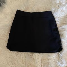 Black Mini Skirt In S Sleek Black Mini Skirt, Black Stretch Skort For Spring, Night Out Solid Color Lined Skort, Solid Color Relaxed Skort For Night Out, Summer Black Pencil Skirt Skort, Black Pencil Skirt Skort For Summer, Elegant Black Skort For Date Night, Black Stretch Skort With Lined Skirt, Black Stretch Lined Skort