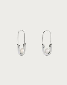 Silver Petite Safety Pin Earrings
| En Route Jewelry | En Route Jewelry Single Safety Pin Earring, En Route Jewelry, Safety Pin Earrings, Carnelian Stone, Jewelry Inspo, Sierra Leone, Safety Pin, Zambia, Cute Jewelry