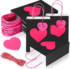 valentine's day gift bags with pink paper hearts