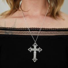 Embrace unique style with our Silver Gothic Cross Necklace. Elevate any outfit with this bold and elegant accessory. Stand out from the crowd with this one-of-a-kind piece that will add a touch of edgy sophistication to your wardrobe. Good to Know: Dainty chain that can be worn at a variety of lengths Our Charm Necklaces look incredible with our stunning Circle Earrings! Silver Plated  Charm Length 6mm x 4cm Diameter  Sizing Choker - 12-14" (Extendable), Short necklace - 16" Long necklace - 20" Trendy Cross Jewelry For Party, Edgy Metal Cross Jewelry, Edgy Cross-shaped Metal Jewelry, Silver Cross Pendant Jewelry For Party, Silver Cross Pendant Necklace For Party, Silver Cross Jewelry For Party, Silver Cross Necklace For Party, Gothic Cross Pendant Jewelry For Party, Bohemian Cross Jewelry For Party