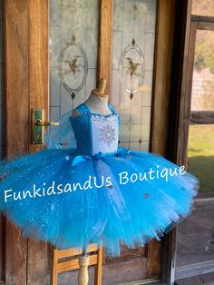 Welcome to Baby/Infants Clothing  by Funkids&Us Boutique Stunning Turquoise Glittery tulle Dress  This is so gorgeous Dress perfect for your little one special even  dress for a party or dress-up play. The dress is made from premium turquoise tulle and glittery sequin tulle, each strand includes a turquoise tulle and sequin glittery tulle. The skirt part is full of snowflakes design. beautiful in person. The crochet bodice part embellishment of sparkle leather sequin.  Please specify the length: Measure your child from armpit downward/floor.                                                  The dress can be made in Knee length/below the knee or full length/floor length. PLEASE PROVIDE MEASUREMENT :  To measure for **length place a tape measure under the arm (armpit area) and measure down th Glitter Tulle Dress, Olaf Halloween Costume, White Barefoot Sandals, Blue Sparkly Dress, Princess Tutu Dresses, Dress Glitter, Handmade Tutu, Snow Dress, Queen Princess