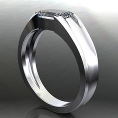 a diamond ring is shown on a reflective surface