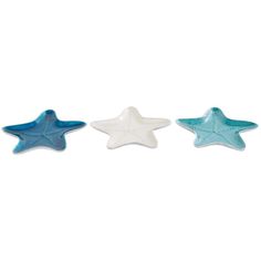 three starfish shaped dishes sitting next to each other