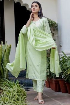 This is 3 piece set.It comes with mirror embellished kurta teamed with trouser and a dupatta to match. 3 Piece Set Fabric-Cotton Color-Green Work-Mirror embellished, embroidered & lace detailing with front & side tassels Kurta Detailing-Calf length kurta with side slits Bottom-Flared Sharara Sleeves-3/4th Sleeves Neck-Round Neck Occasion-Festive wear Washing care-Hand wash Embellished Suit, Green Mirror, Green Mirrors, Match 3, Suit Set, Embroidered Lace, Festival Wear, Indian Wear, Online Retail