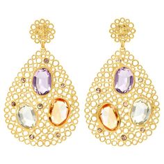 Gold Plated Silver Amethyst, Blue Topaz, Citrine and Cinnamon Diamond Earrings Esther Eyre has been designing and making precious jewellery for over twenty years. She trained at Kingston and Middlesex gaining a BA in jewellery design in 1982. Esther worked briefly in Mappin & Webb before setting up her own business in 1983. Using mainly 18 carat gold and precious stones, Esther designs and makes special commissions for a large number of private clients including members of the Royal family and i Shakespeare In Love, Familia Real, Tilda Swinton, Ringo Starr, Gwyneth Paltrow, Jewellery Design, Precious Jewelry, Gold Plated Silver, Accessories Unique